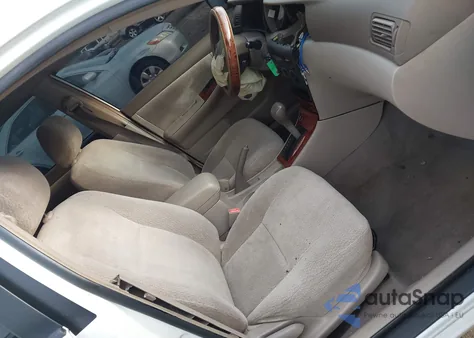 2003 Toyota Corolla Ce/Le z USA, uszkodzony, nr VIN JTDBR32E632010601